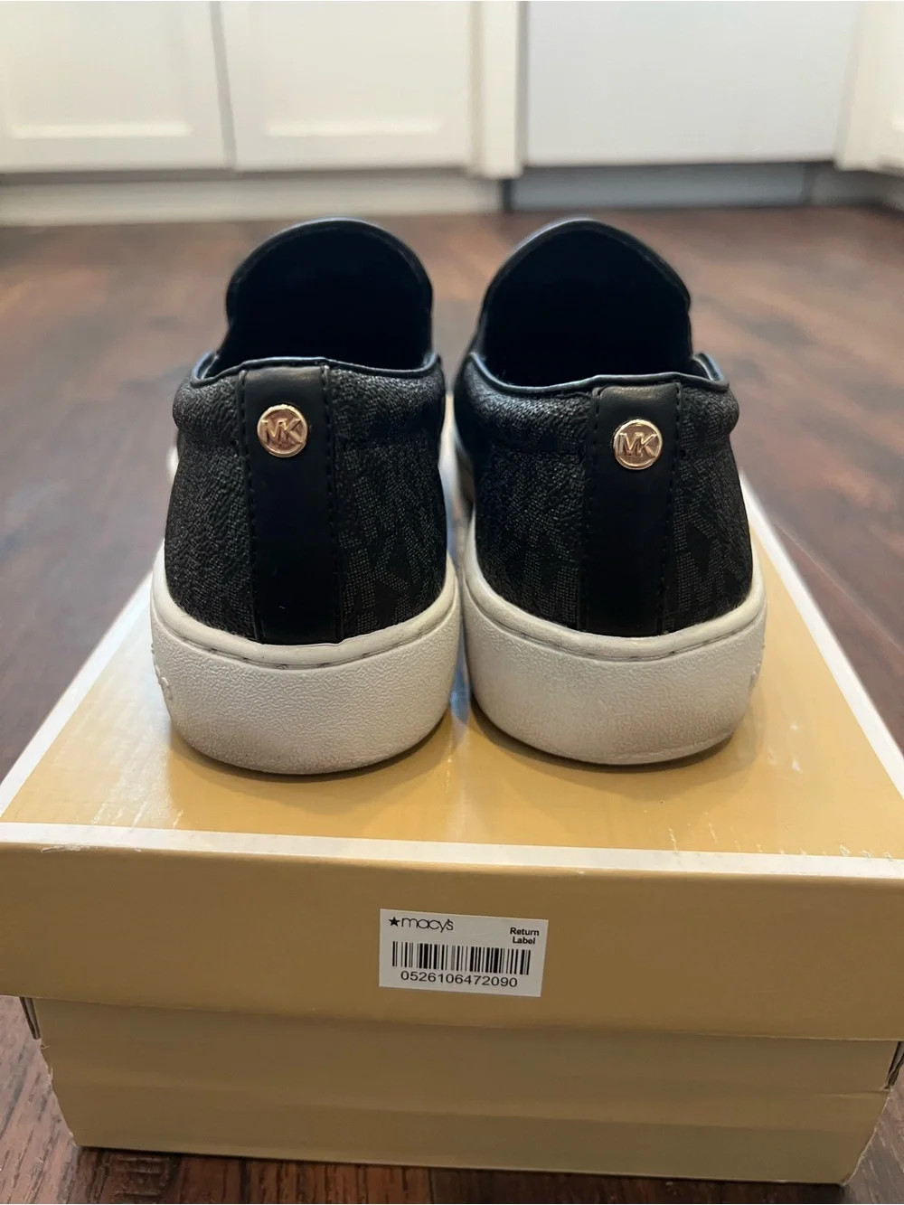 Michael Kors Black Monogram Slip-On Sneakers